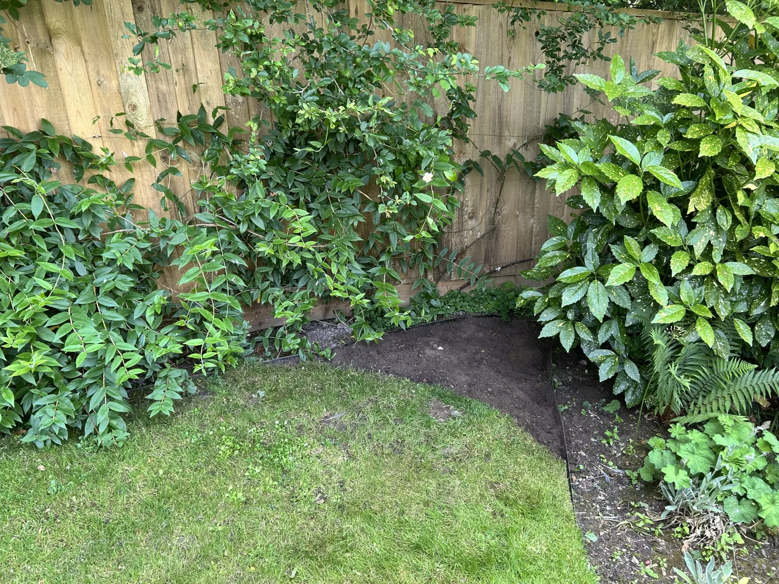 Reshaping the edge of a lawn to make it easier for the customer to mow
