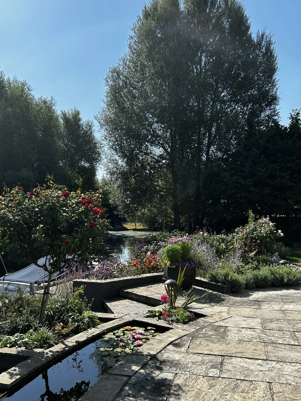Riverside tiered garden cared for to ensure beauty for as long as possible